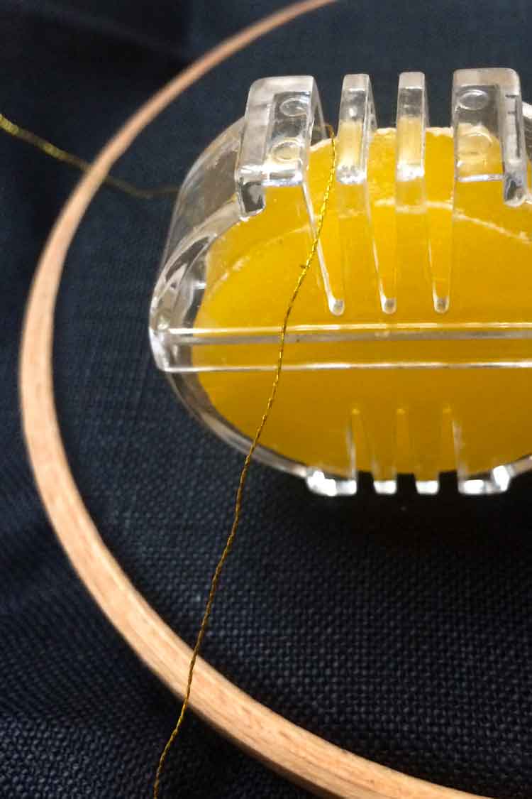 how to apply wax to your embroidery floss