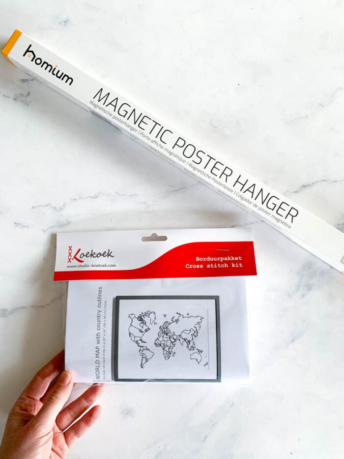 Magnetic poster hangers and world map cross stitch kit. Sale 1702